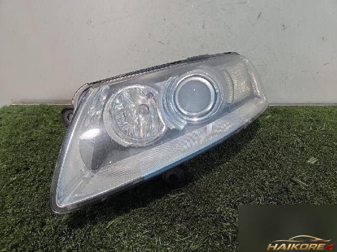 Audi A6 2009 — фара головного света левая 4F0941003