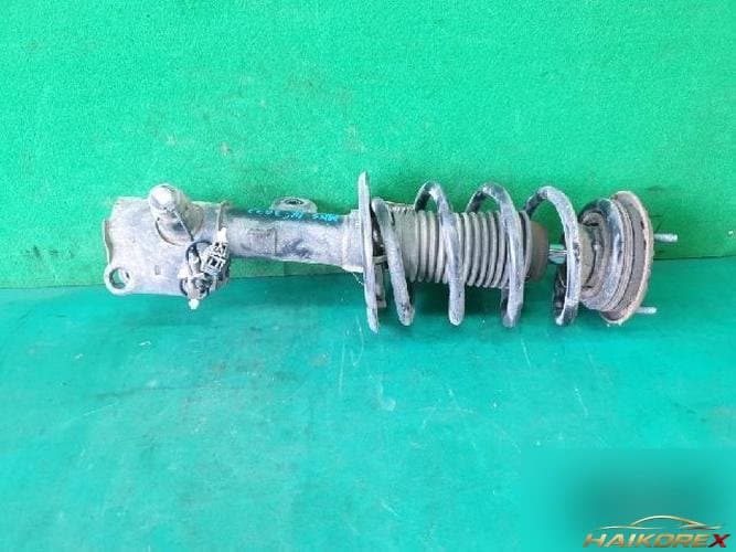 Ford MKS 2014 — амортизатор передний левый DA5Z-18124-K