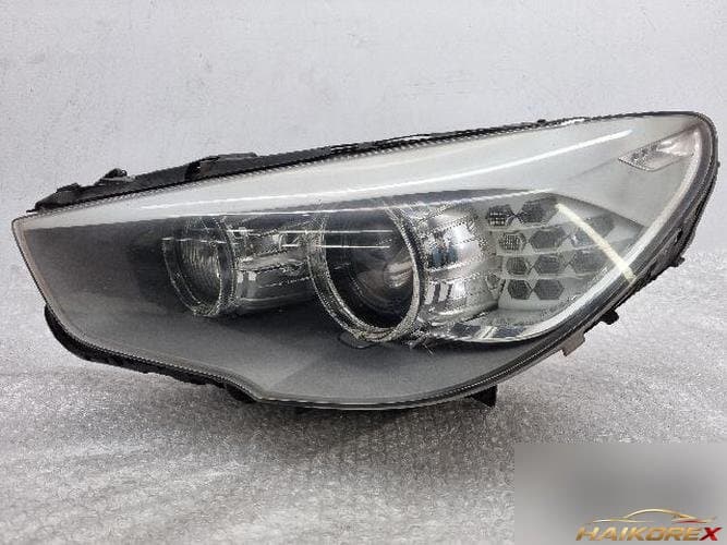 BMW 5 Series 2010 — фара левая (HID)