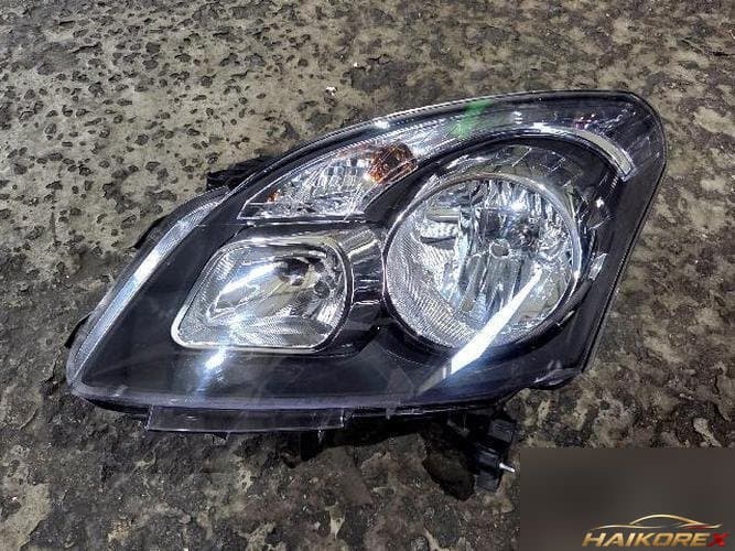 Renault QM5 2010 — фара левая (галоген)