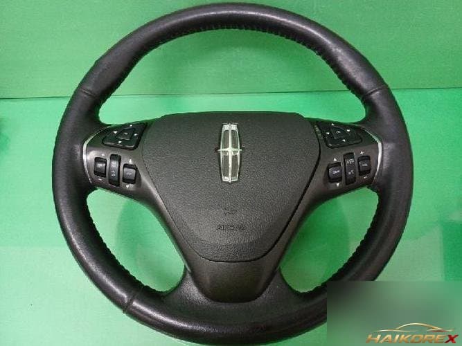 Ford MKS 2014 — рулевое колесо