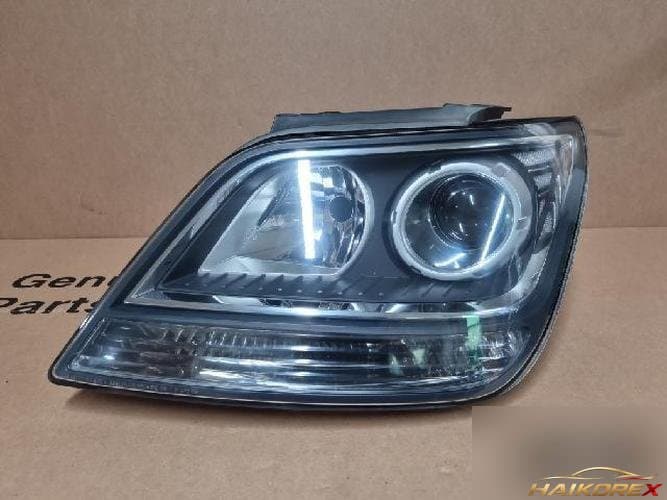 Kia Mohave 2015 — фара левая 921012J570
