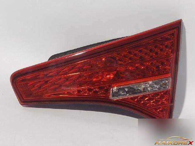 Kia K5 2010 — подсветка багажника 1