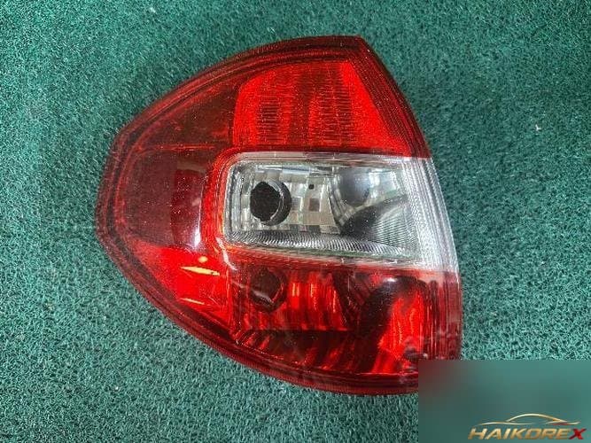 Renault QM5 2010 — комбинированный фонарь задний левый (водительский)