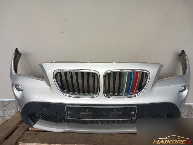 BMW X1 2011 — передний бампер