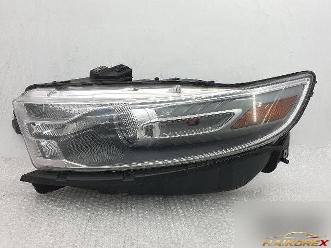 Ford Taurus 2013 — фара левая DG13-13006-AE