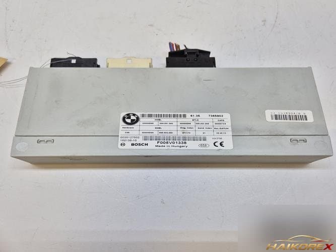 BMW 5 серия 2011 — модуль электрического багажника 61357365902