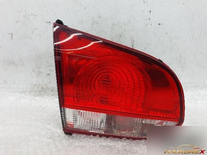 Volkswagen Golf 2013 — накладка задней двери левая (5K0945259)