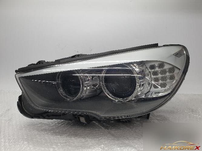BMW 5 Series 2010 — фара передняя левая