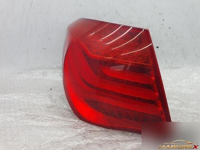 BMW 7 Series 2009 — фонарь задний левый (комбинированный) 7182197