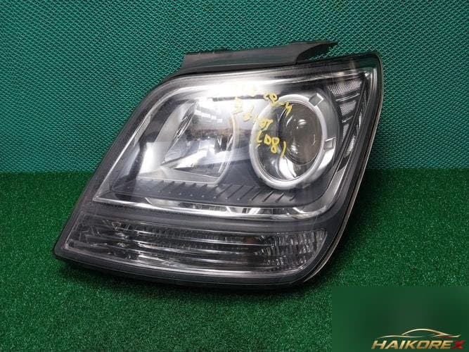Kia Mohave 2008 — фара левая 921012J000