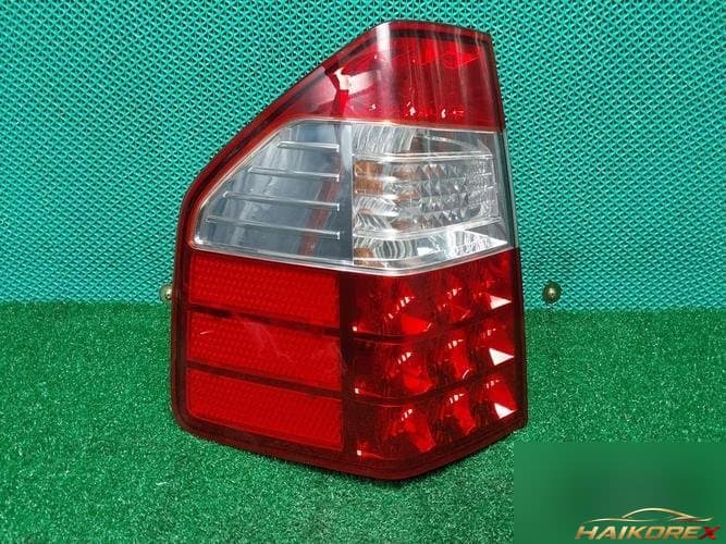 Kia Mohave 2008 — задний комбинированный фонарь левый (водительский) 924012J100