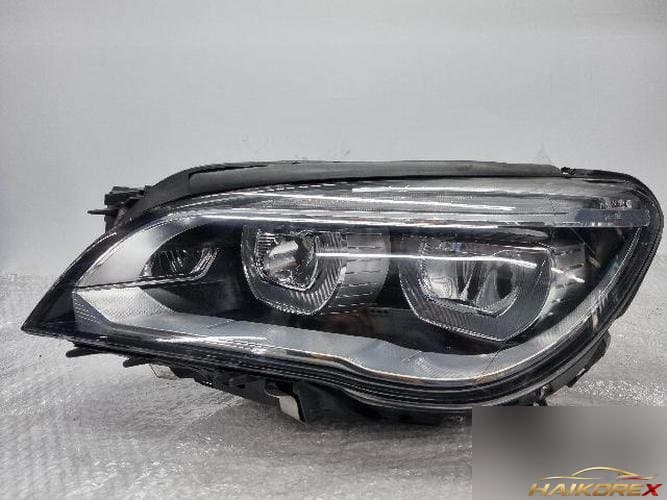 BMW 7 Series 2011 — фара левая (LH)