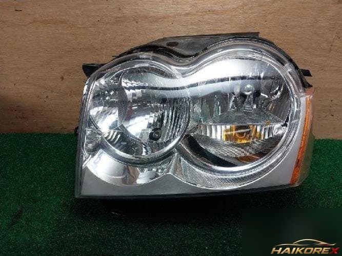Jeep Grand Cherokee 2007 — фара левая 55156671AI 2