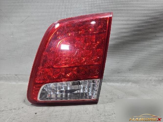 Kia Sorento 2010 — белая отделка багажника 4