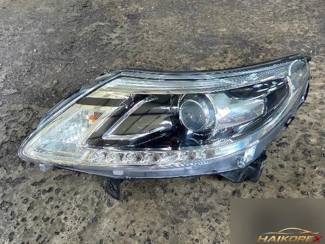 Renault SM5 2014 — фара левая 260606449R