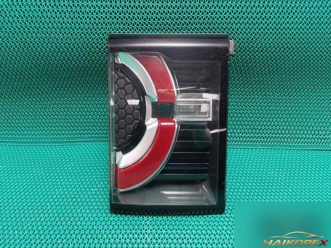 Накладка крышки багажника левая FK7213193BK