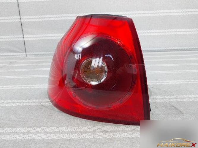 Volkswagen Golf 2008 — комбинированный фонарь (задний левый) 1K6 945 095 AC