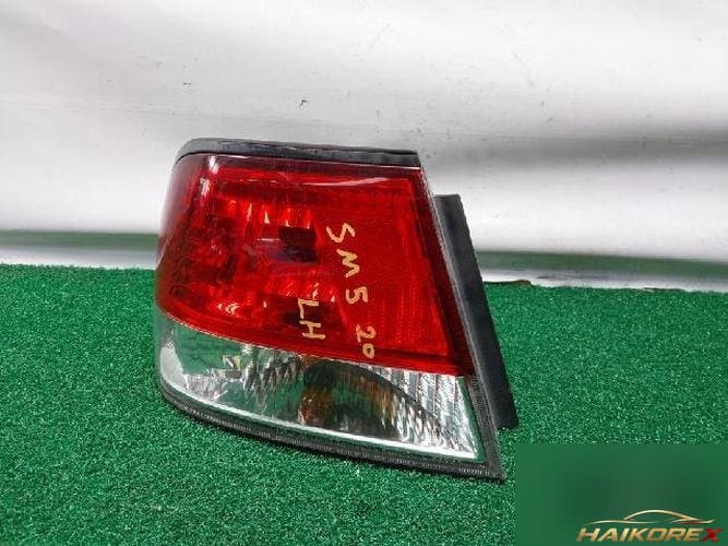 Renault SM5 2003 — задний фонарь левый (водительский)