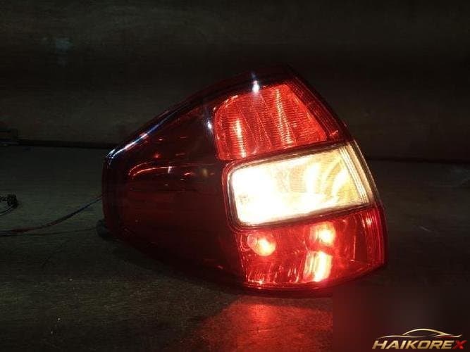 Renault QM5 2009 — задний фонарь левый наружный