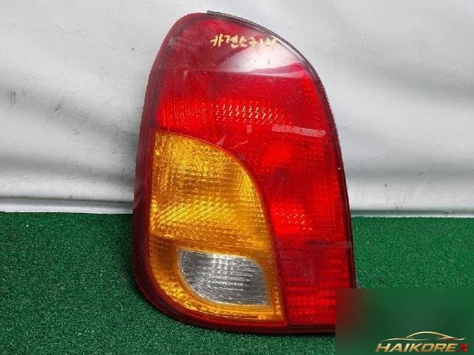 Kia Carens 1999 — фонарь задний комбинированный левый