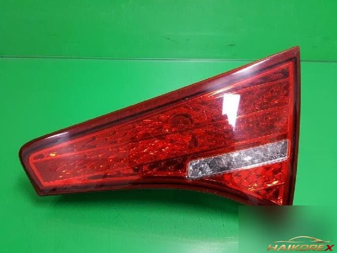 Kia K5 2012 — накладка крышки багажника (с фонарём) 924042T000