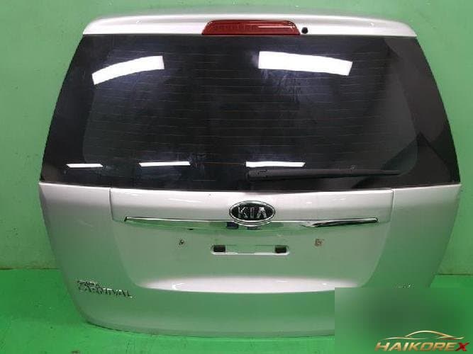 Kia Carnival 2011 — дверь багажника 737004D002